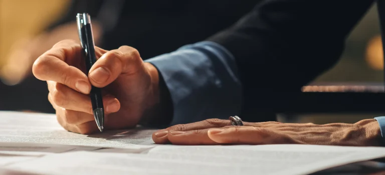 a person holding a pen