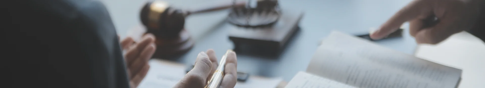 a close up of a hand holding a pen