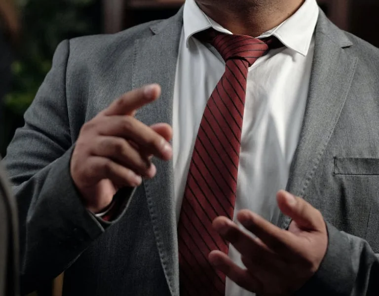 a person in a suit and tie
