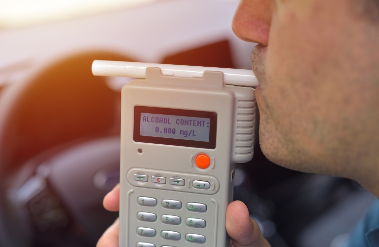 Driver due to being subject to test for alcohol content with use of breathalyzer