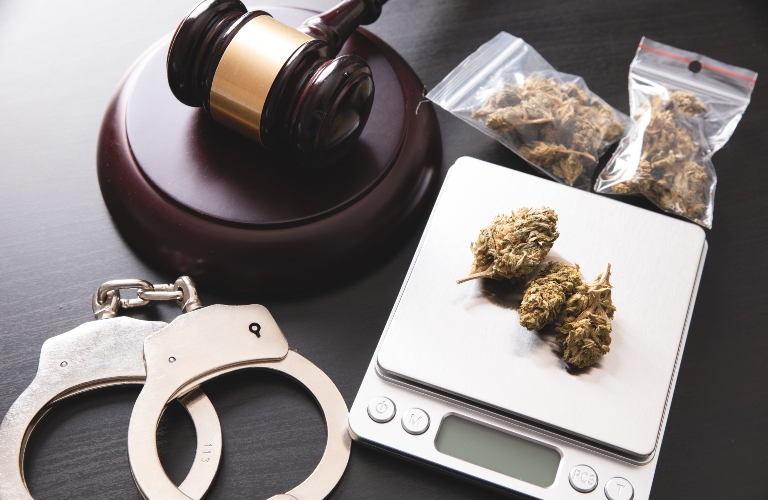 Drug package with hemp. Marijuana bags on scale. Law and crime