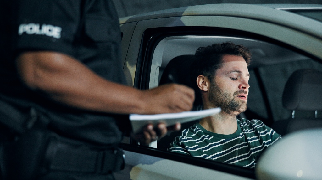 Man, police and writing of ticket fine